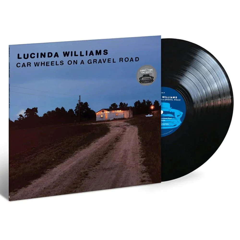 Car Wheels On A Gravel Road